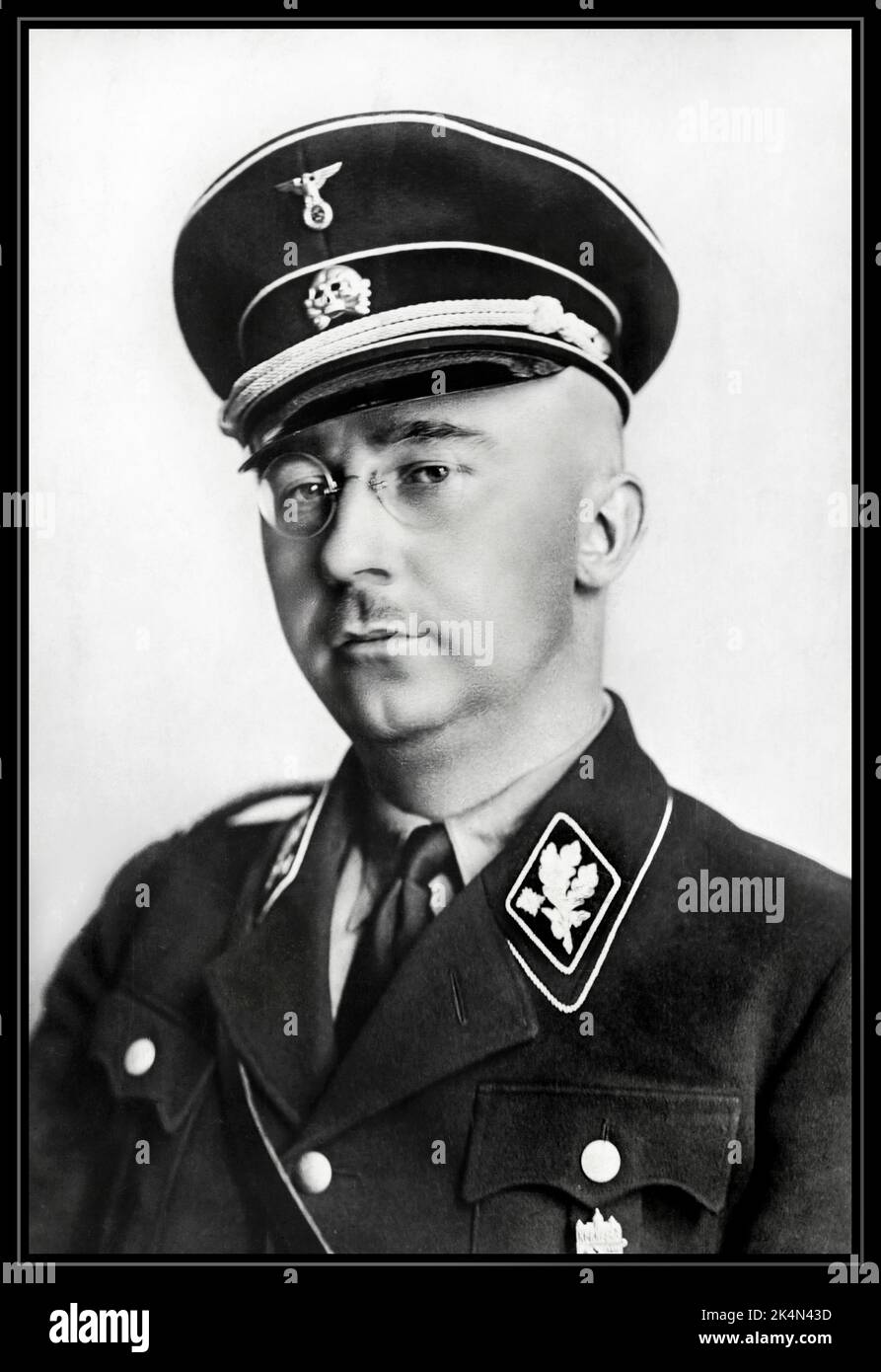 HIMMLER official portrait in SS uniform. 1938 Heinrich Luitpold Himmler was Reichsführer of the Schutzstaffel, and a leading member of the Nazi Party of Germany. Himmler was one of the most powerful men in Nazi Germany and a main architect of the Holocaust.1940's WW2 Heinrich  German National Socialist Politician Nazi military commander secret police. Facilitated genocide across Europe and the east. Committed suicide in 1945 Stock Photo
