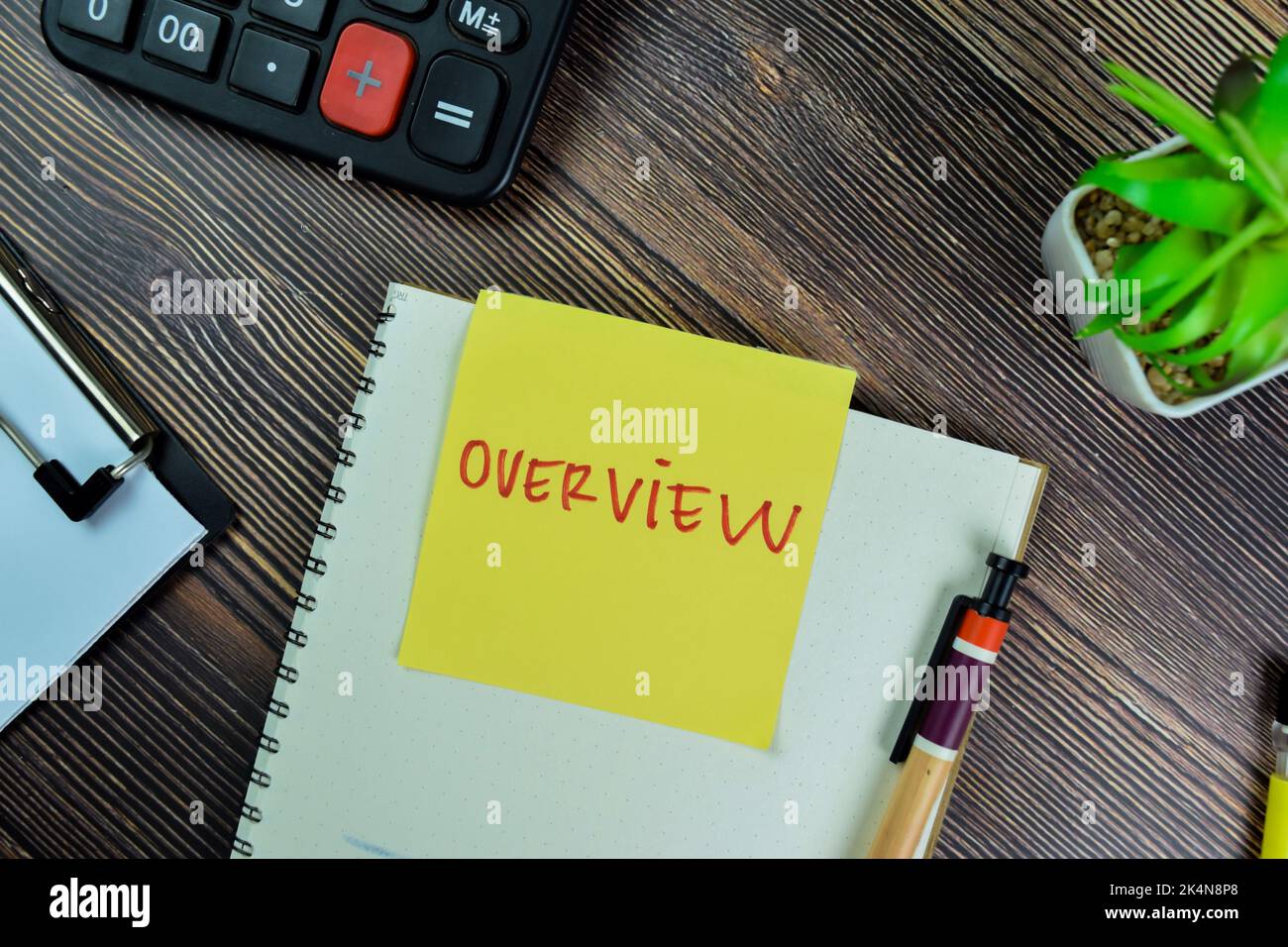 Concept of Overview write on sticky notes isolated on Wooden Table. Stock Photo