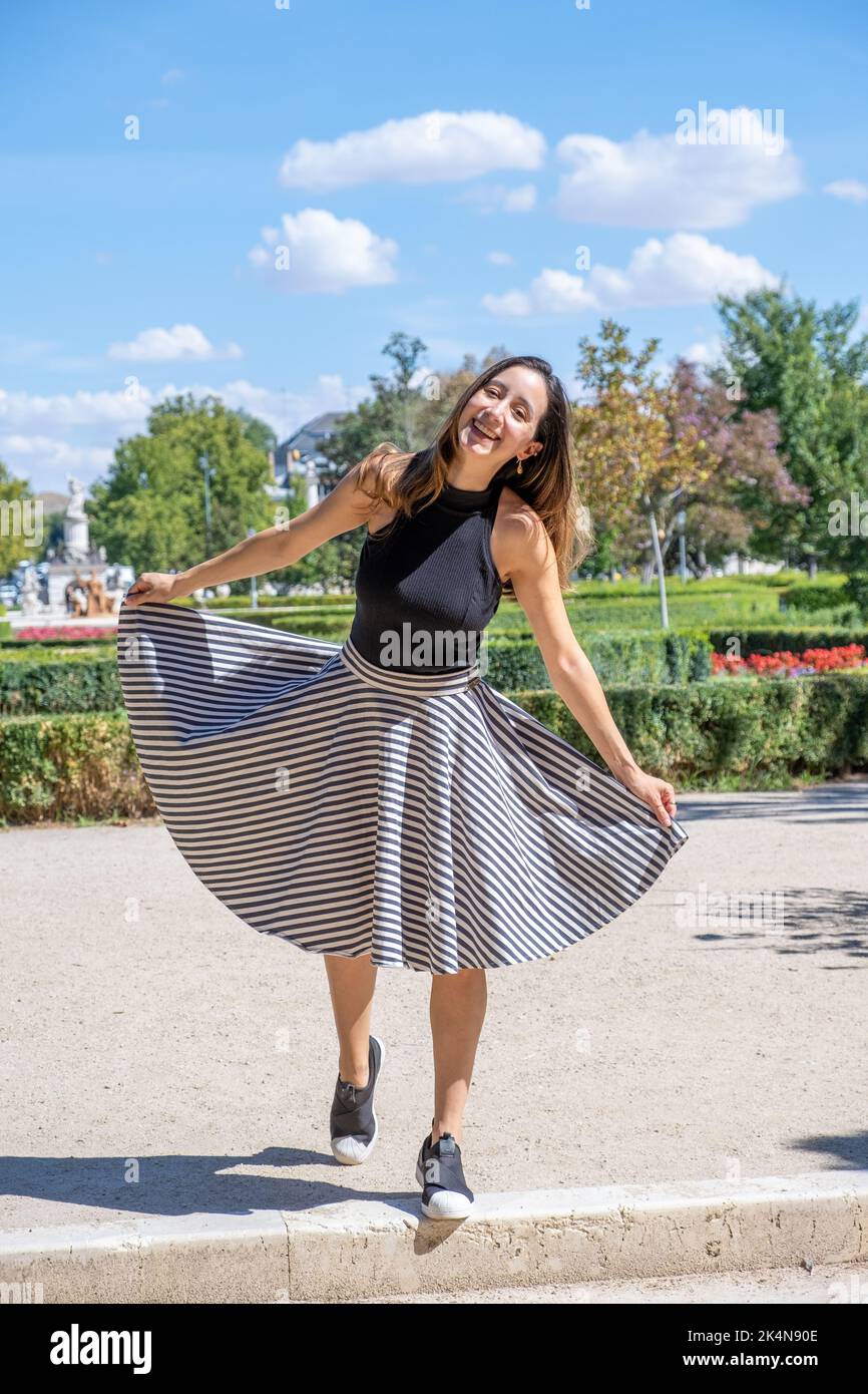 Woman skirt flower hi-res stock photography and images - Alamy