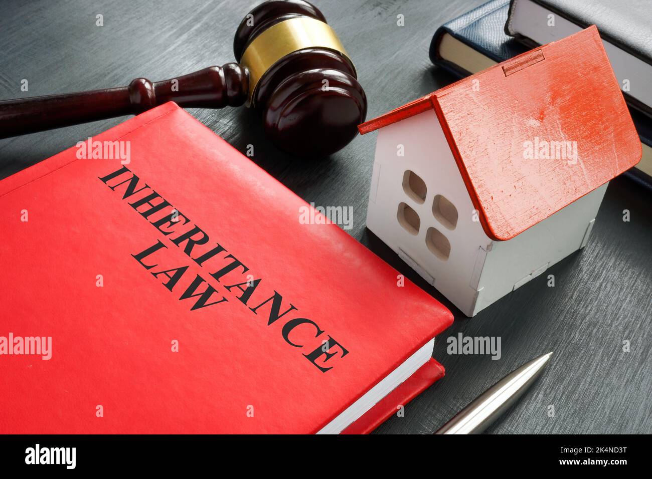 Inheritance law book, model of house and gavel. Stock Photo