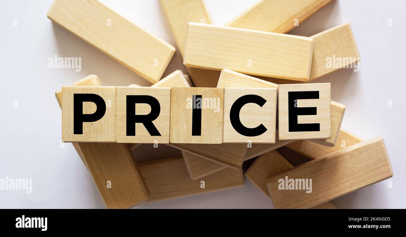 Price word written with a wooden cube on a white background Stock Photo
