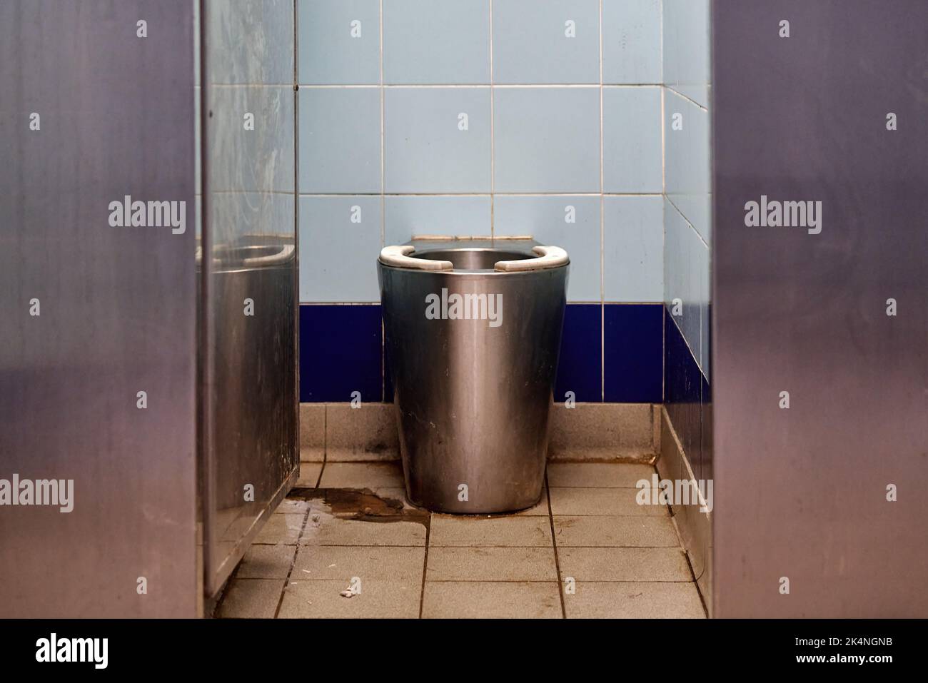 A stainless steel public toilet Stock Photo