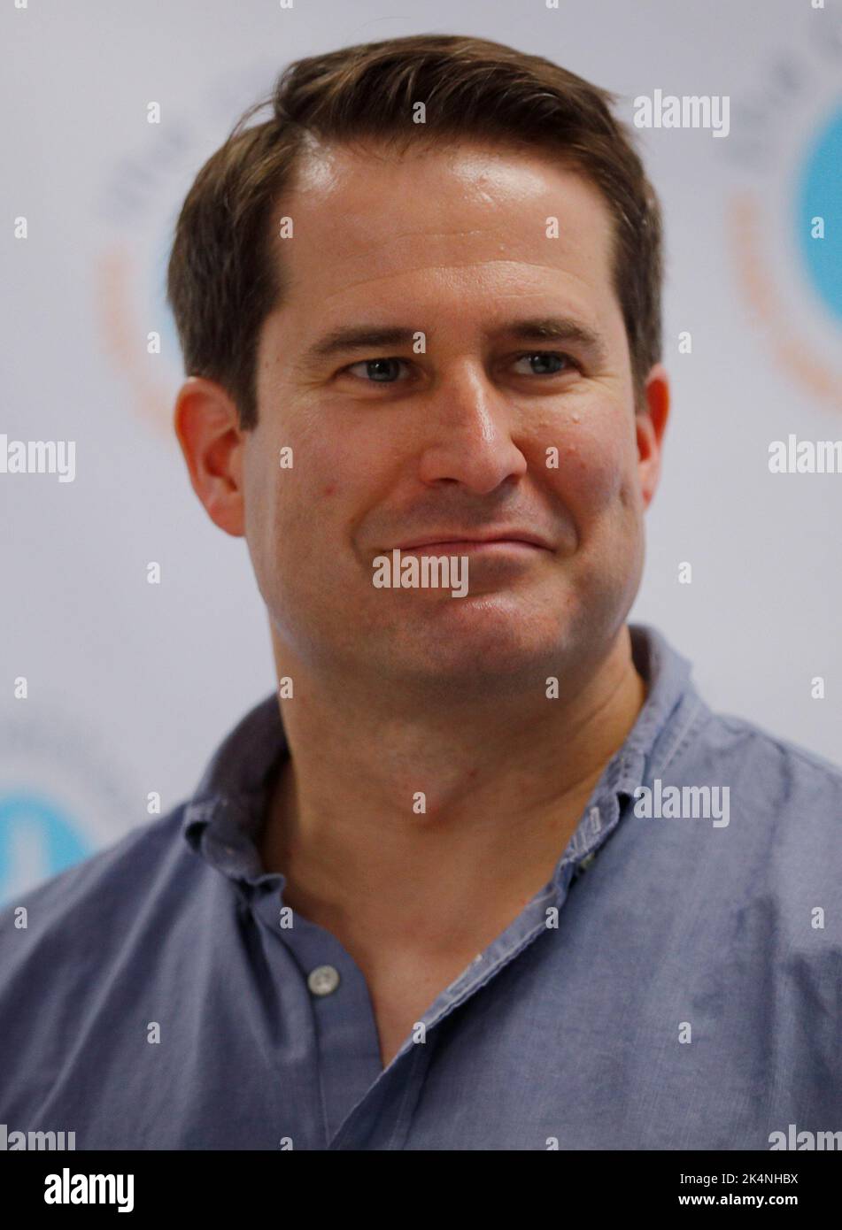 Democratic U.S. Rep. Seth Moulton from Massachusetts running for re-election to the U.S. House of Representatives in the 2022 U.S. midterm elections, listens during a campaign roundtable discussion with representatives from the AmeriCorps Victims Assistance Program in Concord, New Hampshire, U.S., April 23, 2019.   REUTERS/Brian Snyder Stock Photo