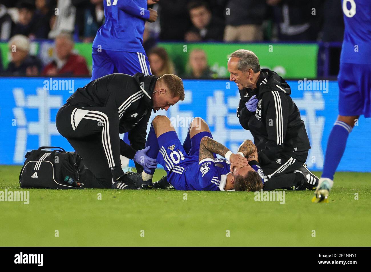 James Maddison #10 of Leicester City receives treatment for an injury during the Premier League match Leicester City vs Nottingham Forest at King Power Stadium, Leicester, United Kingdom, 3rd October 2022  (Photo by Mark Cosgrove/News Images) Stock Photo