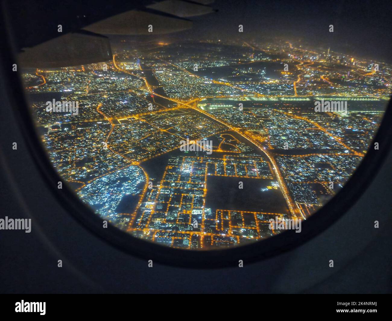 Aeriel view of Dubai skyline in night from an aeroplane,Dubai skyline,night view dubai,dubai nightview,dubai landscape,dubai Stock Photo