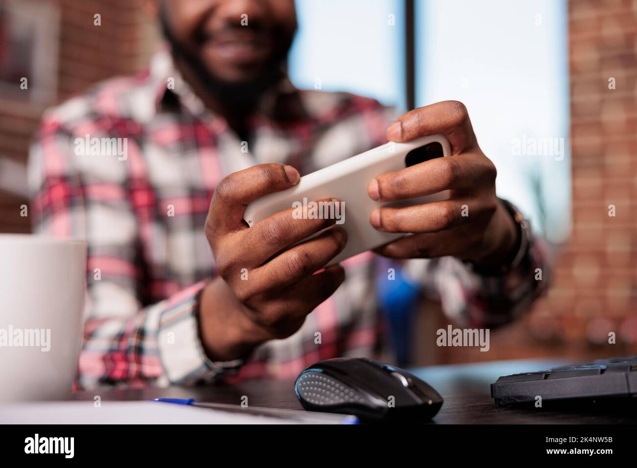 Playing game phone adult hi-res stock photography and images - Page 6 -  Alamy