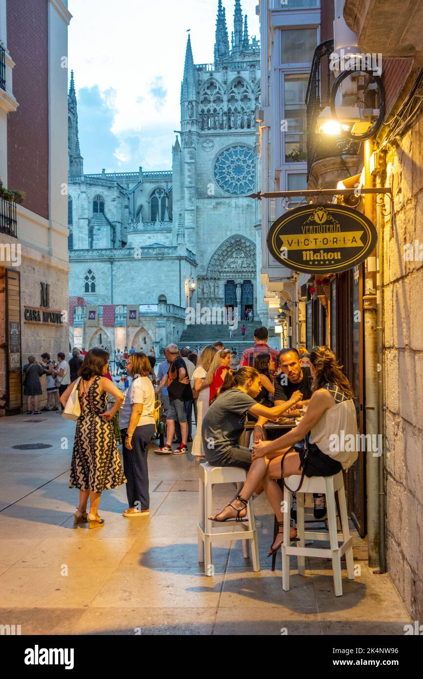 Nighttime evening dusk in the side streets of Burgos Spain with people