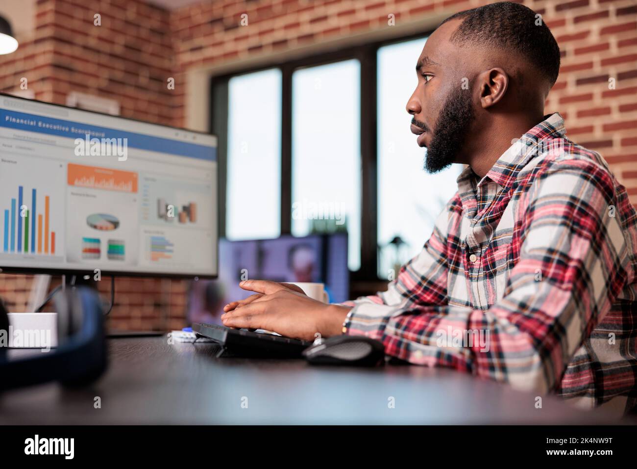 Business manager checking diagrams on computer, analyzing research data ...