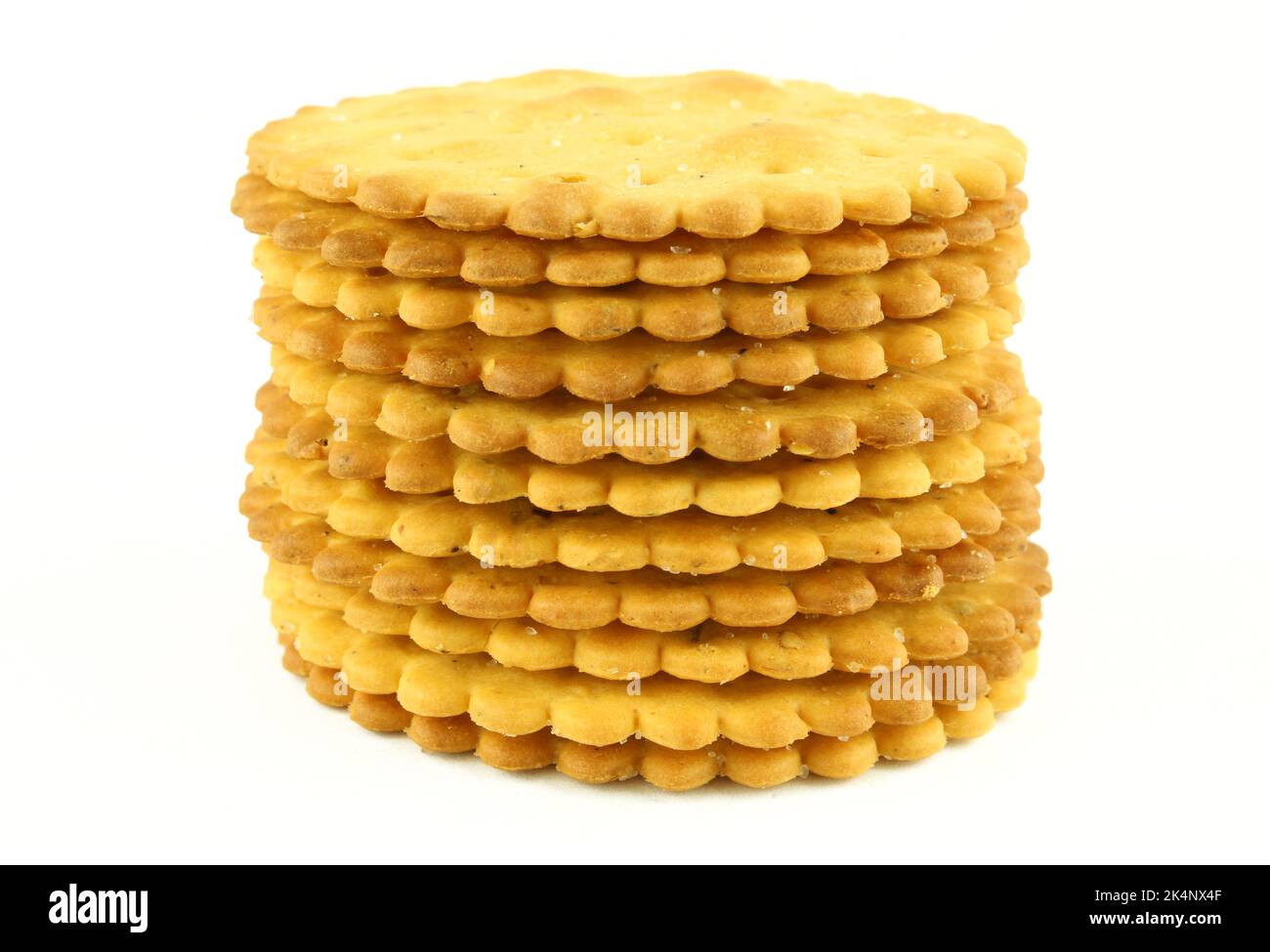 Stack of round salty crackers isolated on white background Stock Photo ...
