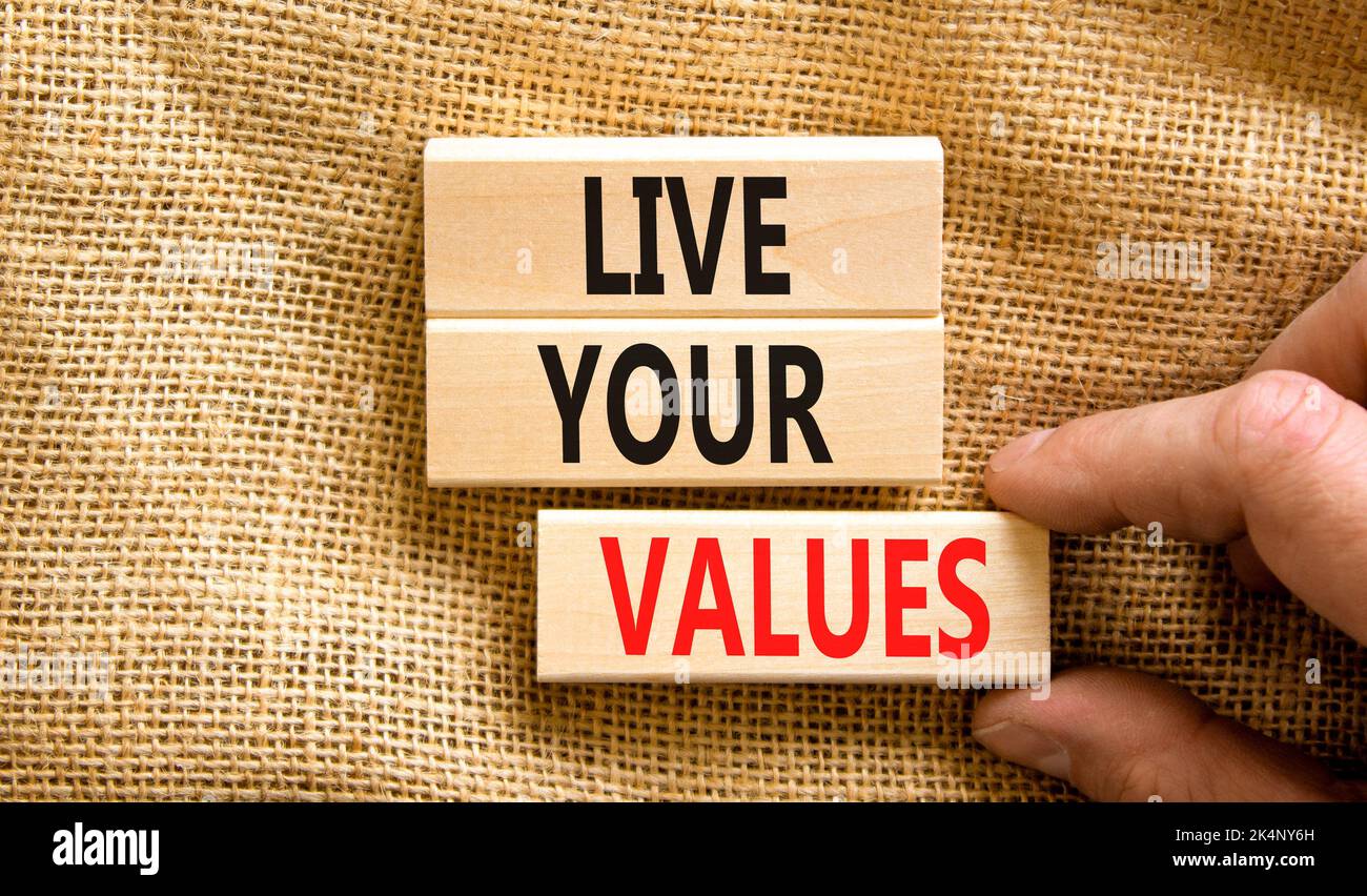 Live your values symbol. Concept words Live your values on wooden ...