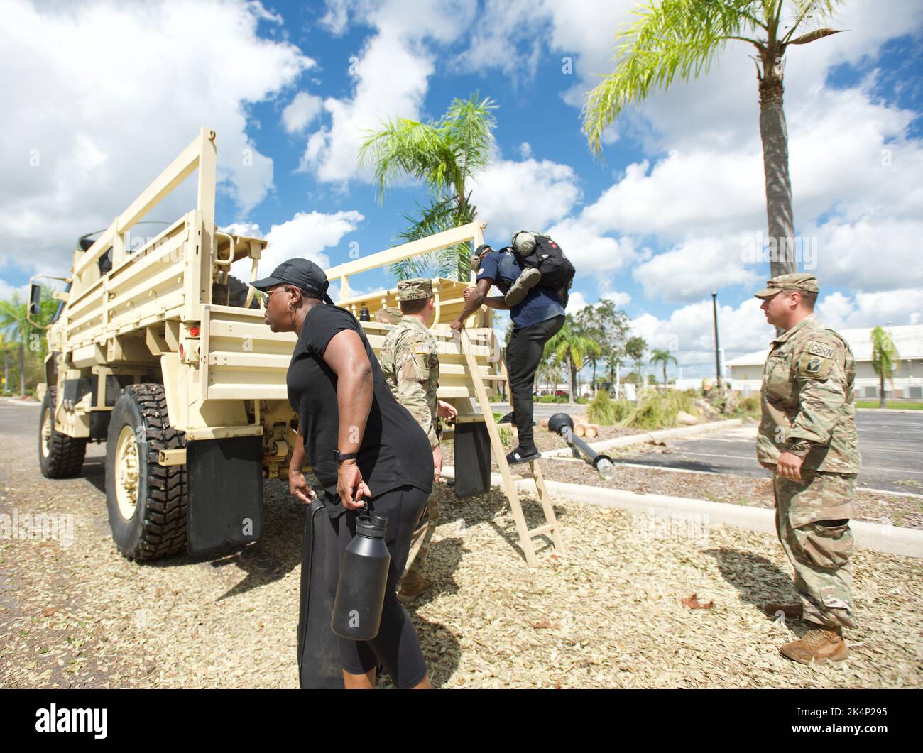 North Port, Florida, USA. 1st Oct, 2022. Soldiers from the National Guard 753rd Brigade Engineering Battalion assist evacuees fleeing rising flood waters of the Myakka River, in the aftermath of Hurricane Ian, at Foundation Church. (Credit Image: © Jerry D Beard/ZUMA Press Wire) Stock Photo