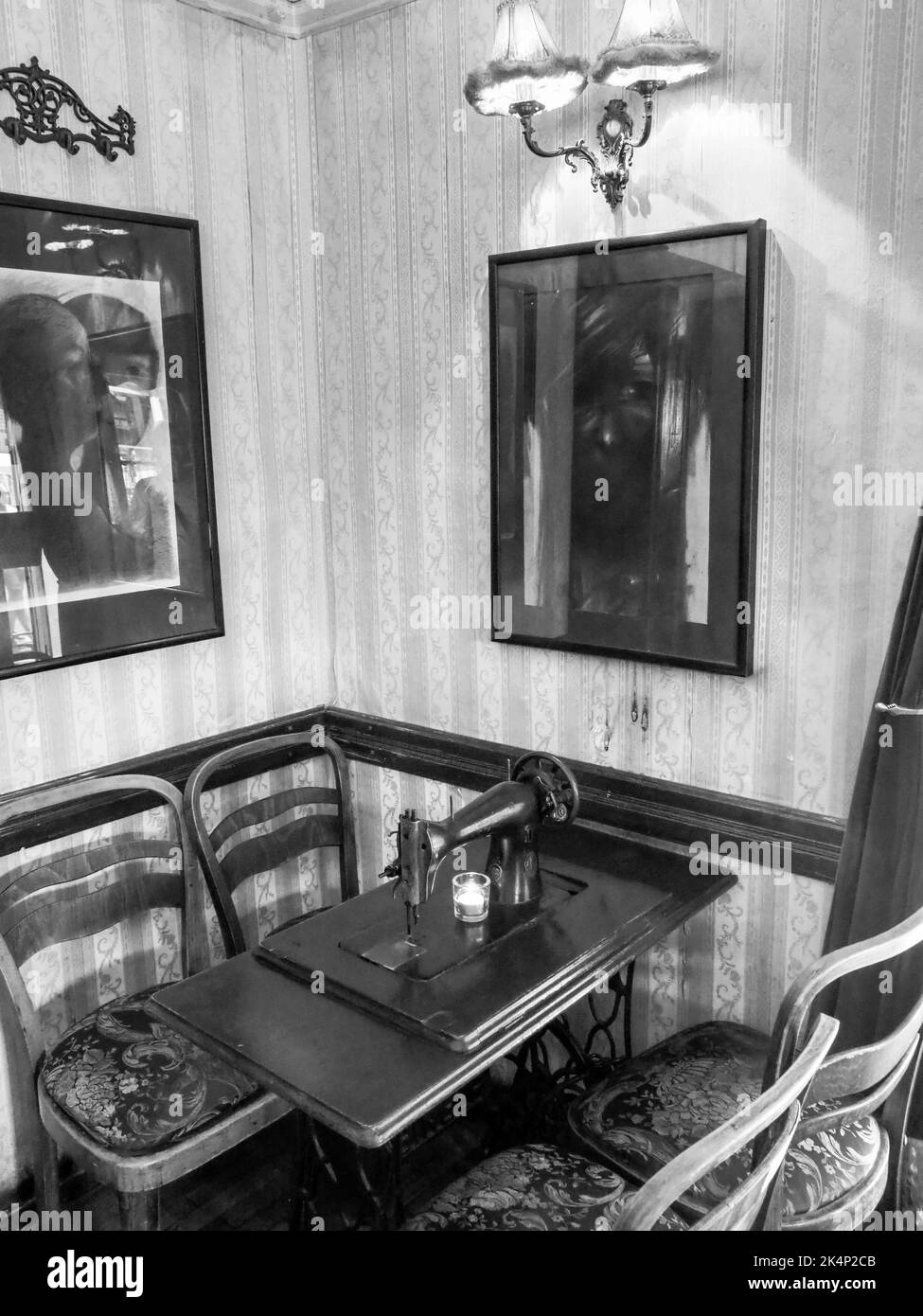 Krakow, Poland - August 4, 2018: Singer klub café with sewing machines as coffee tables Stock Photo