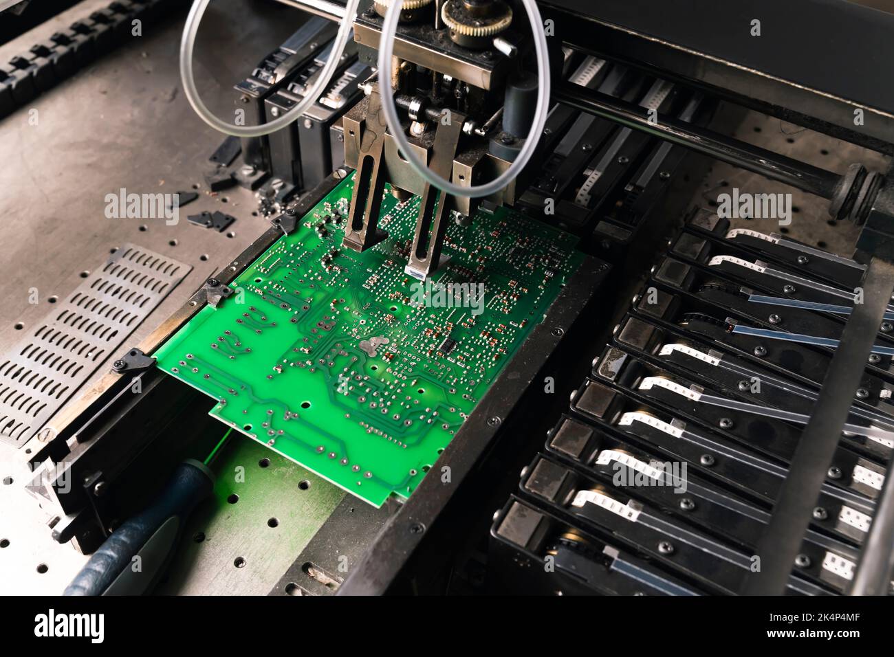 Close up of SFD surface-mount device working on PCB printed circuit board. Assembling. Modern technology. High quality photo Stock Photo