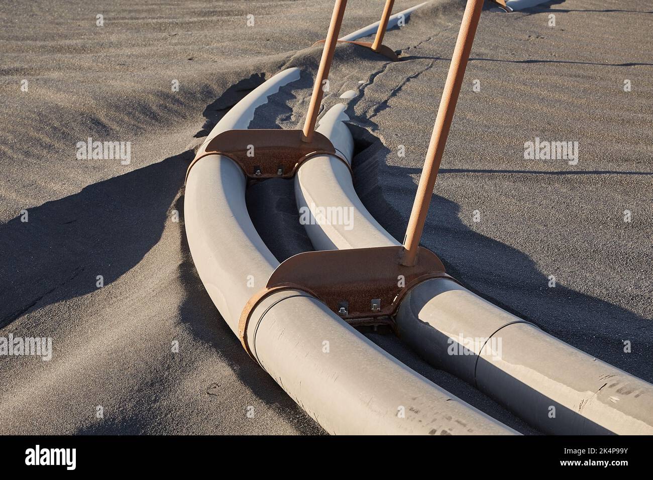 Pipes running on the ground Stock Photo