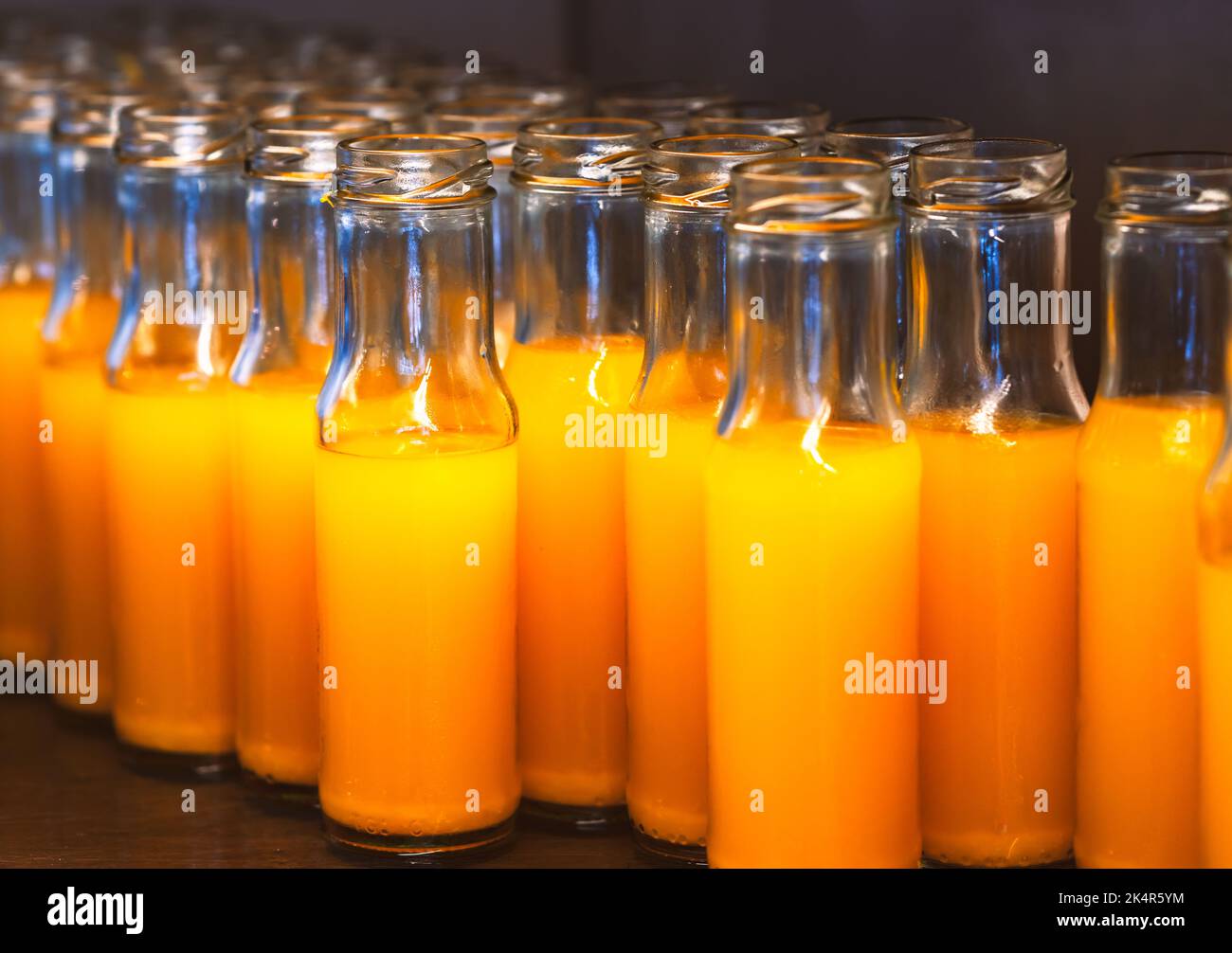 Juice In Small Clear Glass Bottles Stock Photo - Download Image