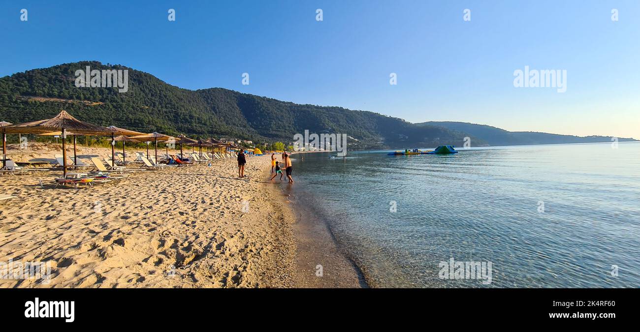 Thassos, Greece - August 19, 2022: Panorama with the Golden Beach (Skala Potamia) during a sunny summer morning. Stock Photo