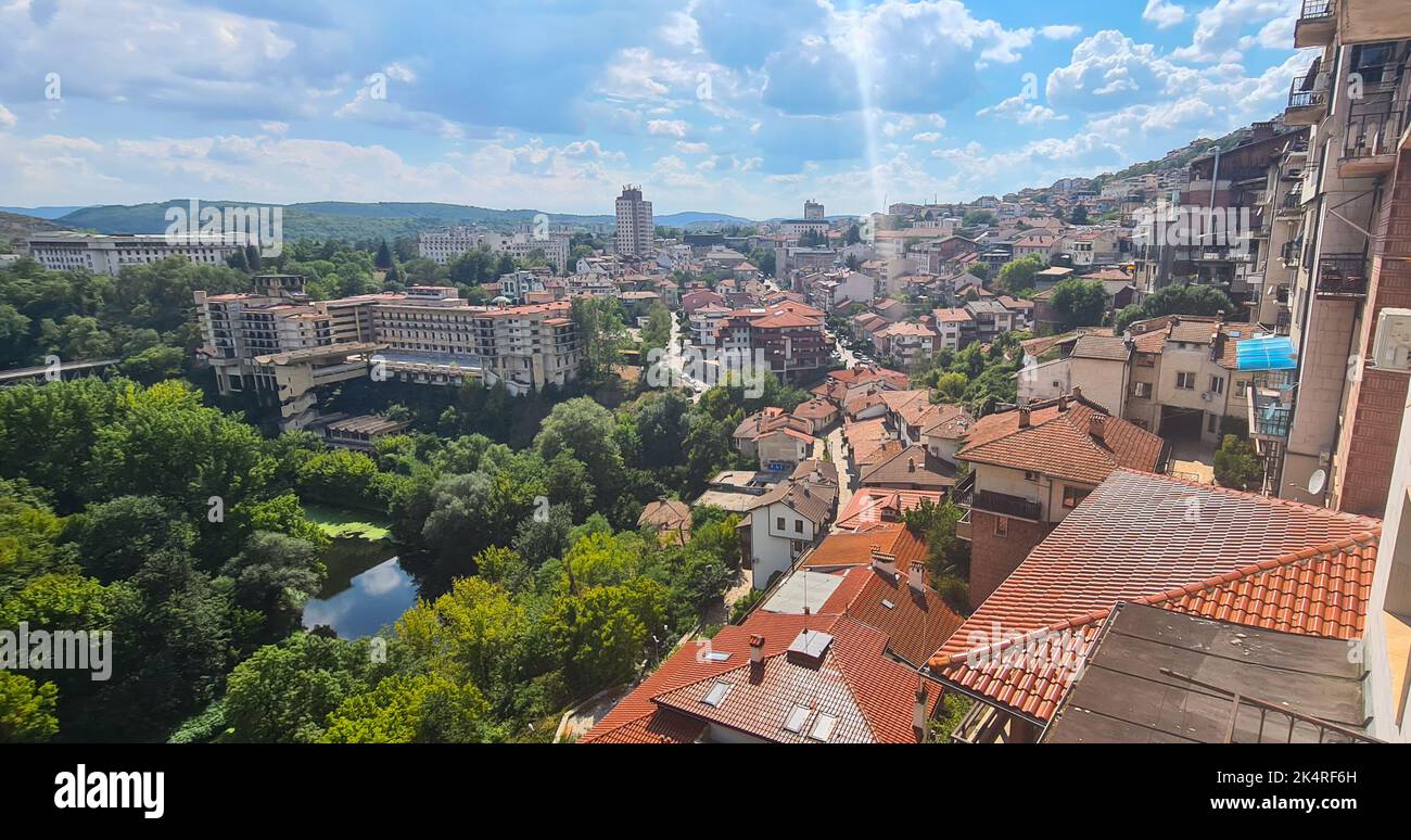 Veliko Tarnovo, Bulgaria - August 17, 2022: Overview panorama with the Veliko Tarnovo town in Bulgaria during a sunny summer day. Stock Photo
