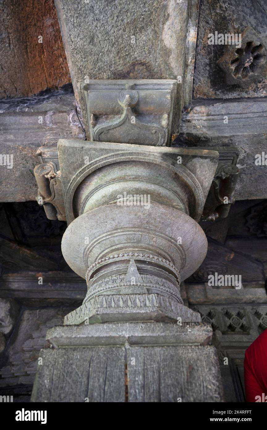 Carved pillar of the Mahadeva Temple, (Tambdi Surla)a 12th-century Shaivite temple built in the Kadamba style from basalt. Near Bhagwan Mahaveer Wildl Stock Photo