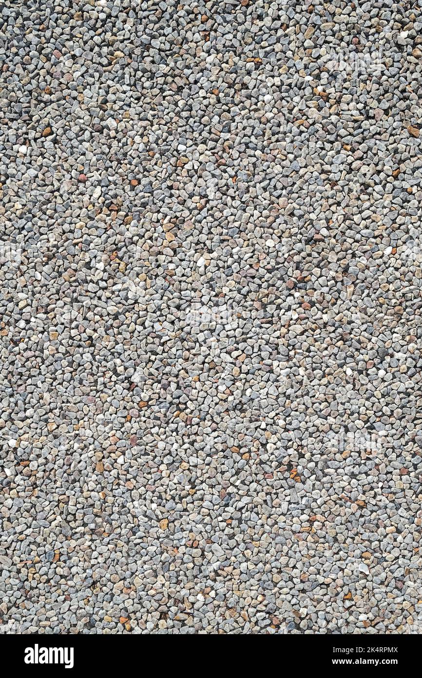 Pattern of gravel on road, grey stone pebbles background Stock Photo