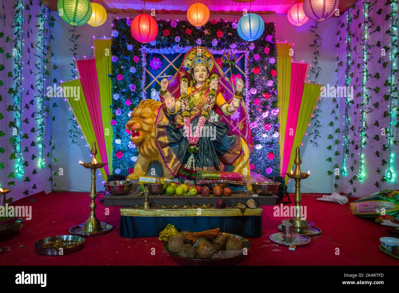 A beautiful idol of Maa Durga being worshipped at a mandal in ...