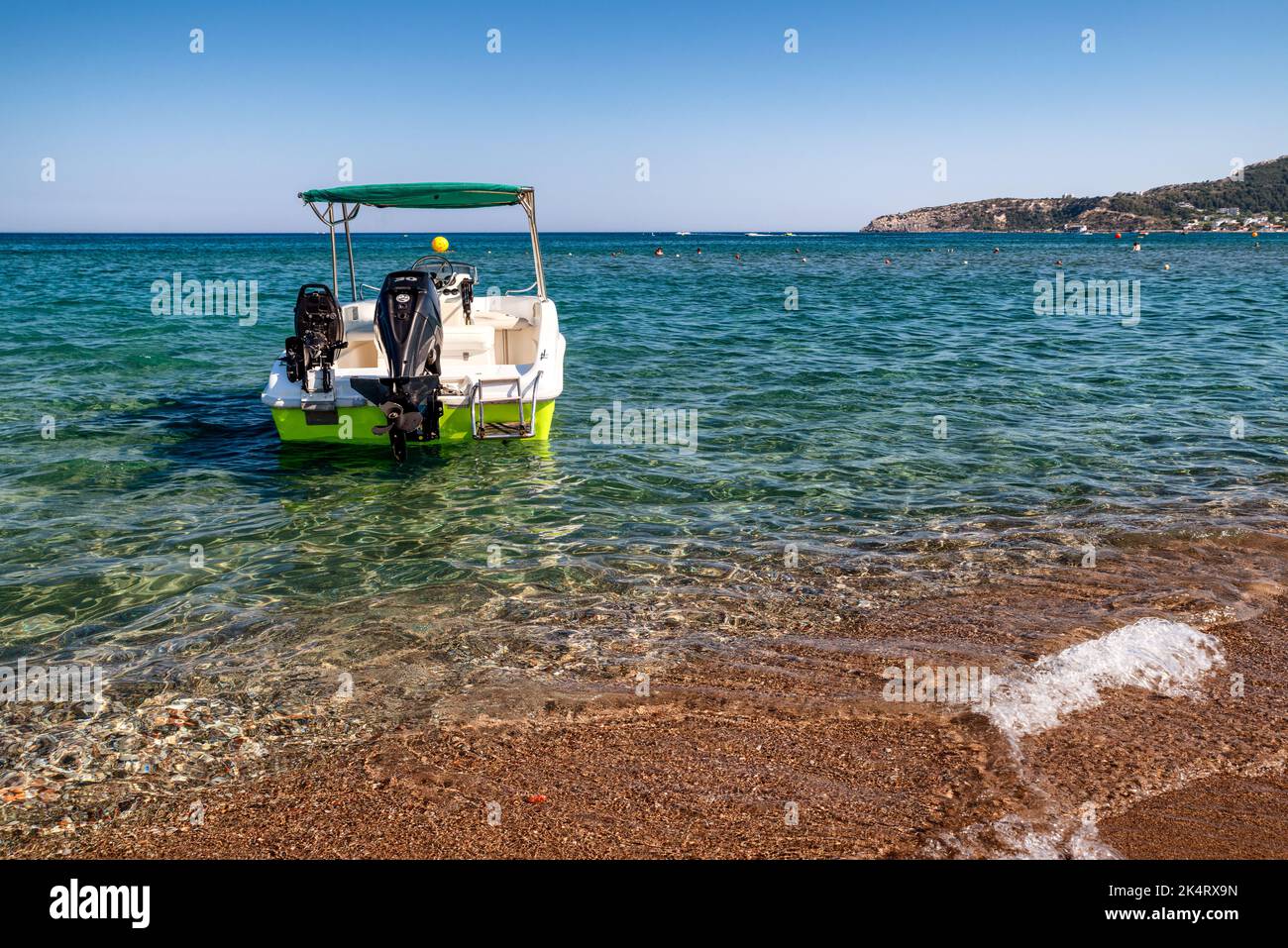 FALIRAKI, GREECE JUN 29, 2022 Boat on the sea at seaside resort Faliraki in Rhodes island