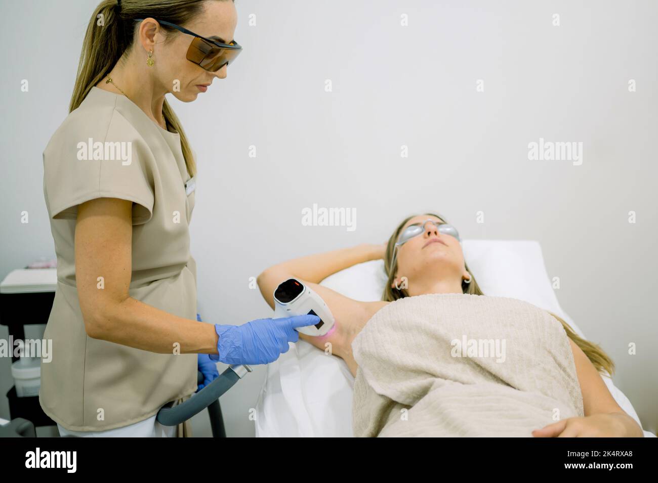 Woman on procedure of ELOS epilation Stock Photo