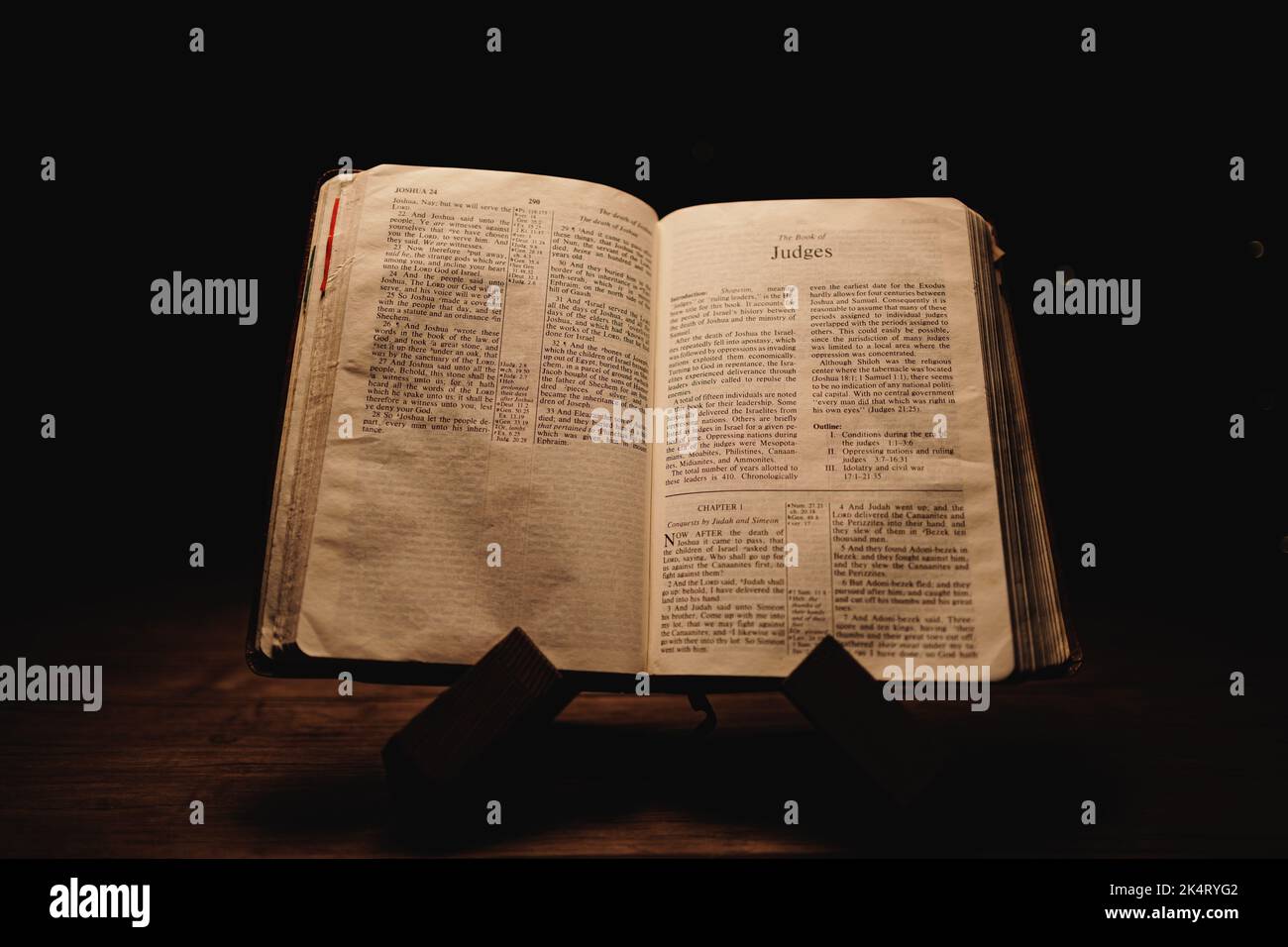 A closeup shot of a historic old Bible open on the Judges pages on ...