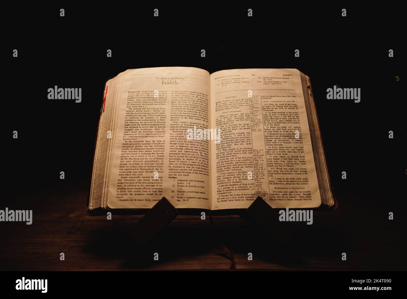 A closeup shot of a historic old Bible open on the Isaiah pages on ...