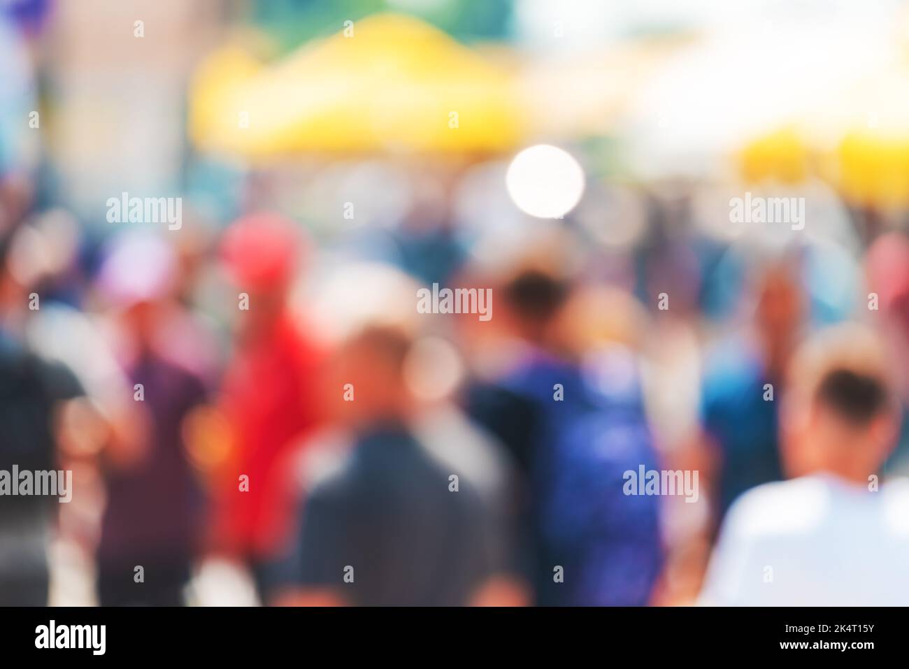 Community of people concept with blurred crowd on street, selective focus Stock Photo