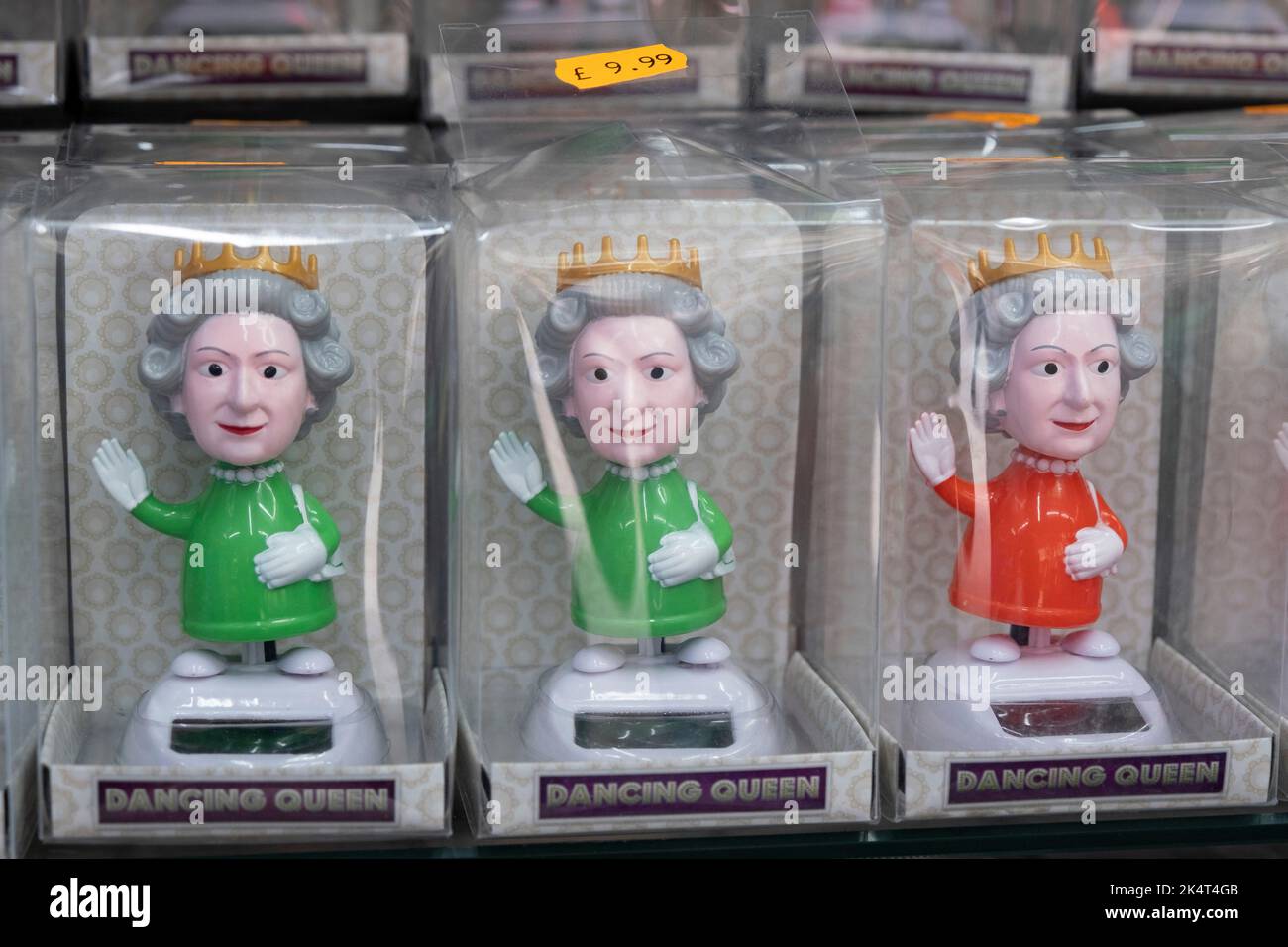 Image of the Queen used on waving bobbing head dolls called Dancing Queen in a souvenir shop following the death of Queen Elizabeth II on 12th September 2022 in London, United Kingdom. The face of the now deceased Queen will be an abiding image for centuries to come, and no doubt will remain sellable on such items. Stock Photo