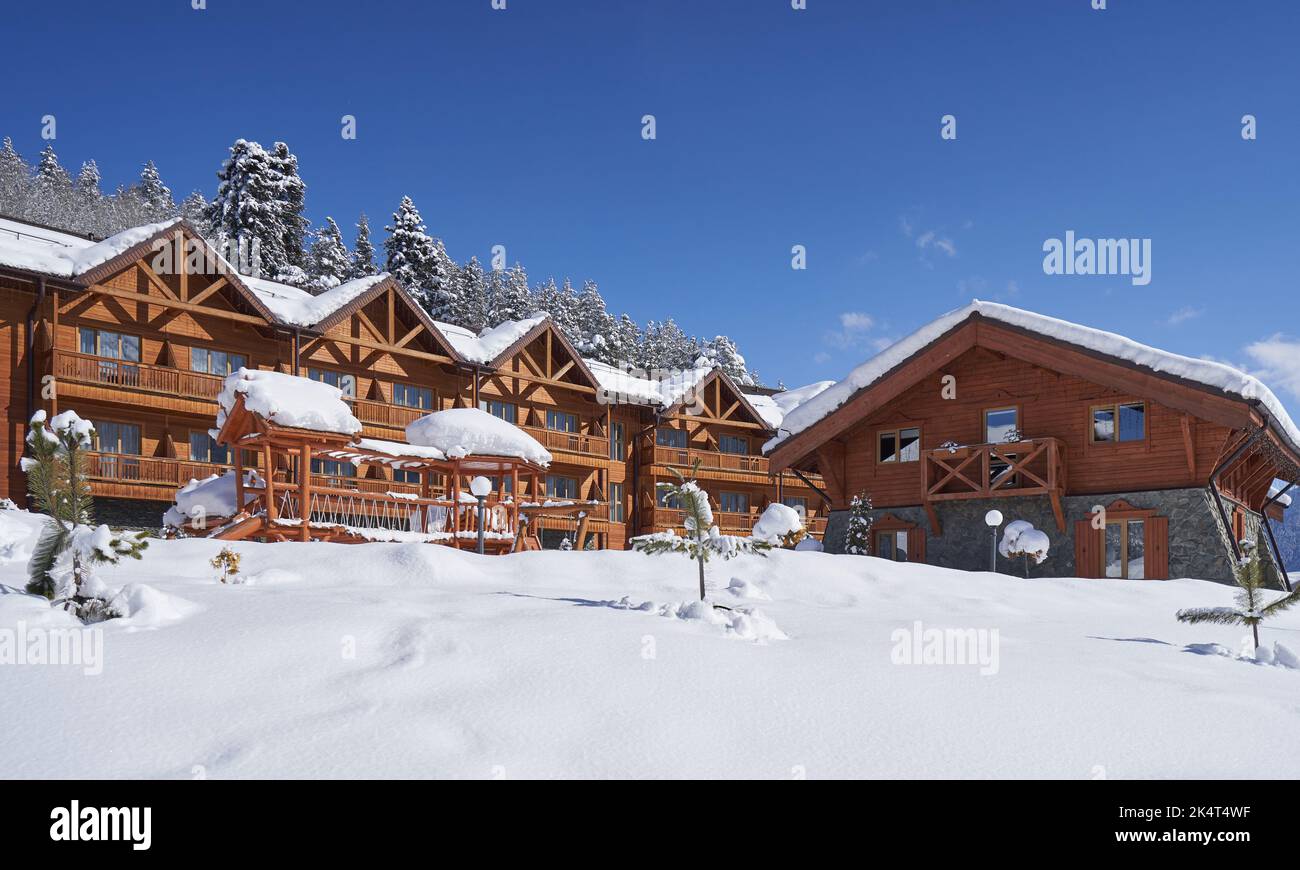 Wooden hotel in the ski resort for tourists. Stock Photo