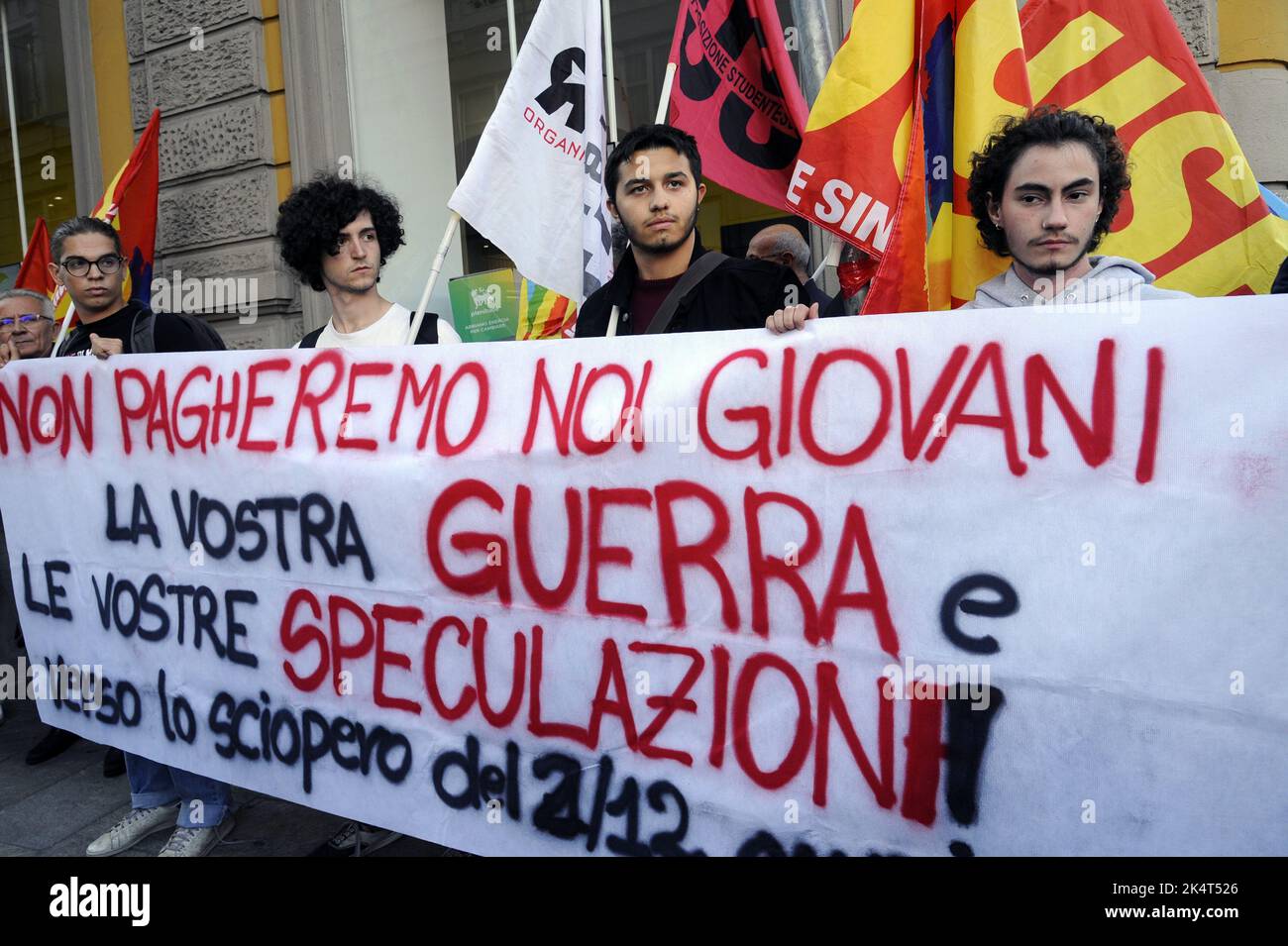 Milan, October 2022, USB base unions protest in front of ENI's city office against rising gas prices due to the international energy crisis and speculation. A facsimile of gas bill is burnt Stock Photo