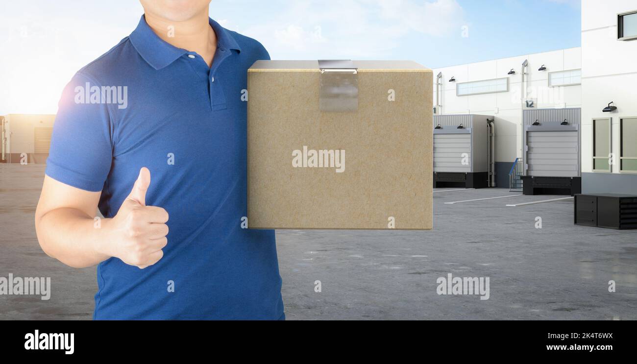 Asian delivery man or warehouse man working Stock Photo