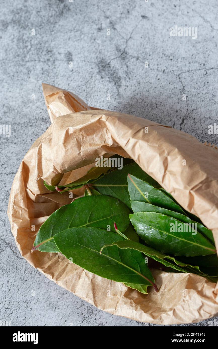 Bay leaves in a brown paper bag. Eco friendly recycle packaging Stock