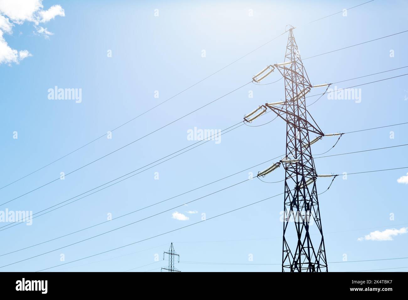 Electric pole with wires under the blue sky Stock Photo - Alamy
