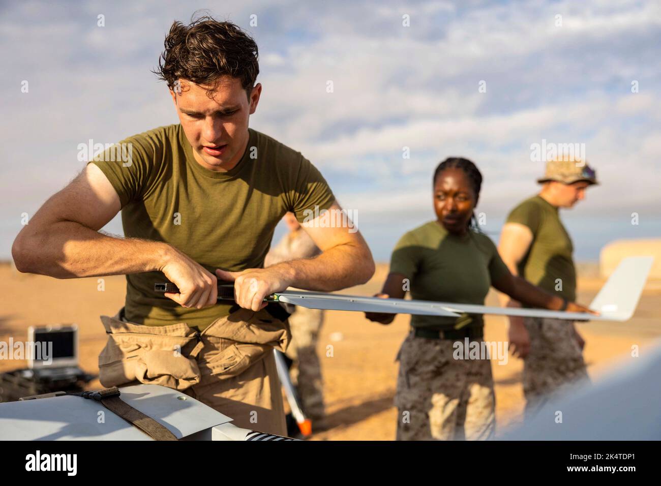 Arizona, USA. 21st Sep, 2022. U.S. Marine Corps Sgt. Johnny Scantland from Denver, Colorado, left, and Cpl. Rijdyna Jules from Haiti, both unmanned aircraft system technicians with Marine Unmanned Aerial Vehicle Squadron 2, Marine Aircraft Group 14, 2nd Marine Aircraft Wing, prepares a U.S. Marine Corps RQ-21A Blackjack for launch during Weapons and Tactics Instructors (WTI) course 1-23 at Canon Air Defense Complex (P111), near Yuma, Arizona, Sept. 21, 2022. The Weapons and Tactics Instructor course is a seven-week training event hosted by Marine Aviation Weapons and Tactics Squadron On Stock Photo