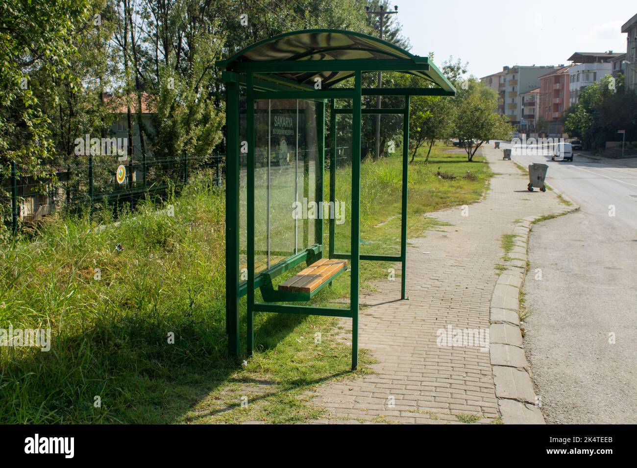 Green bus stop. Sakarya is a city in Turkey. Translation of the stop text: Sakarya metropolitan municipality. Stock Photo