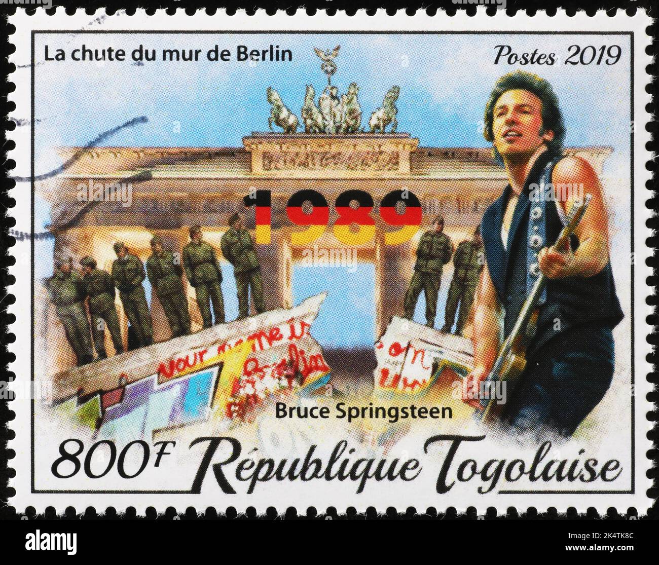 Bruce Springsteen an the fall of Berlin wall on stamp Stock Photo