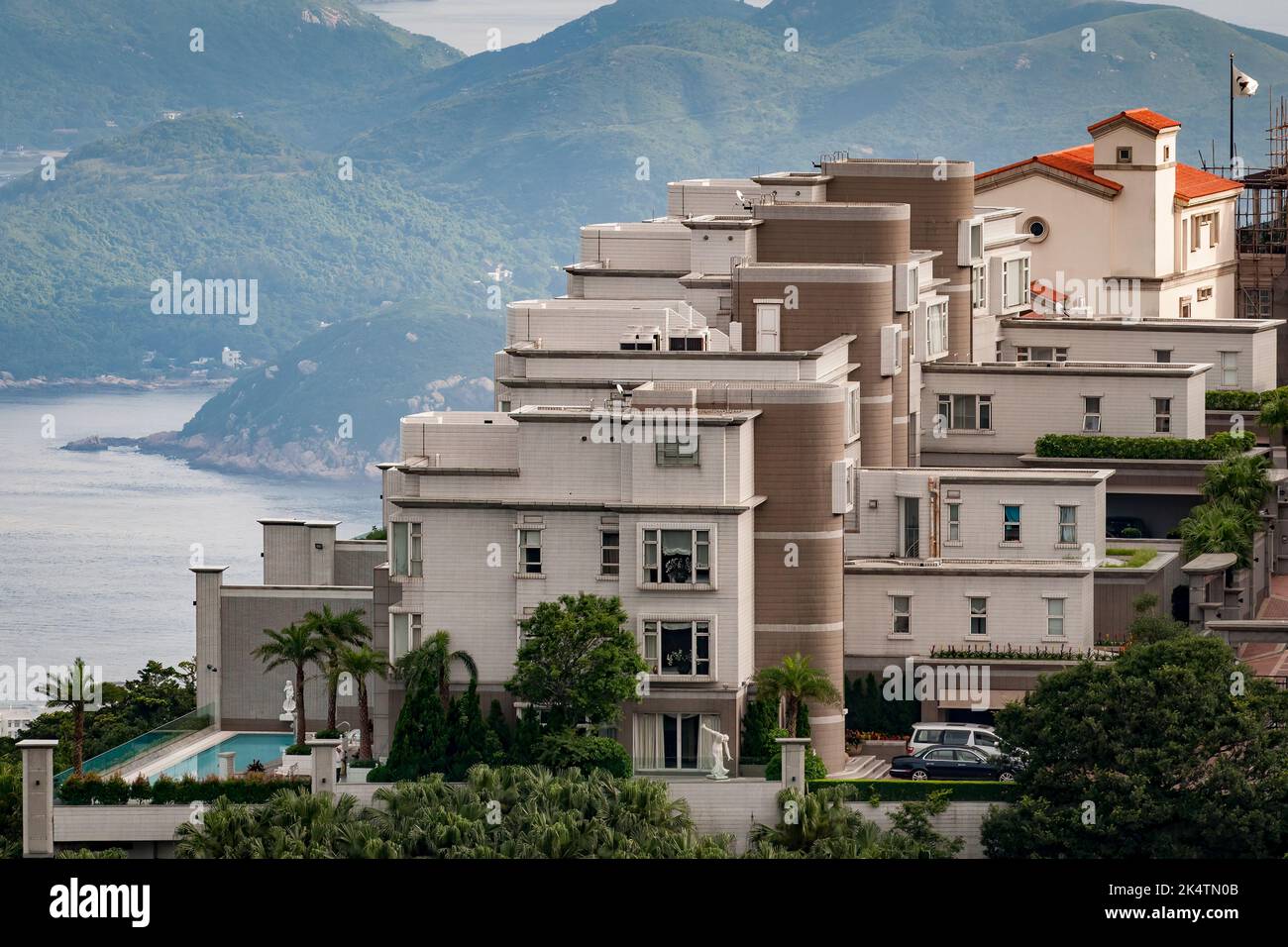 84 Peak Road, with Villa Rosa at rear - luxury houses on The Peak, Hong Kong Island Stock Photo