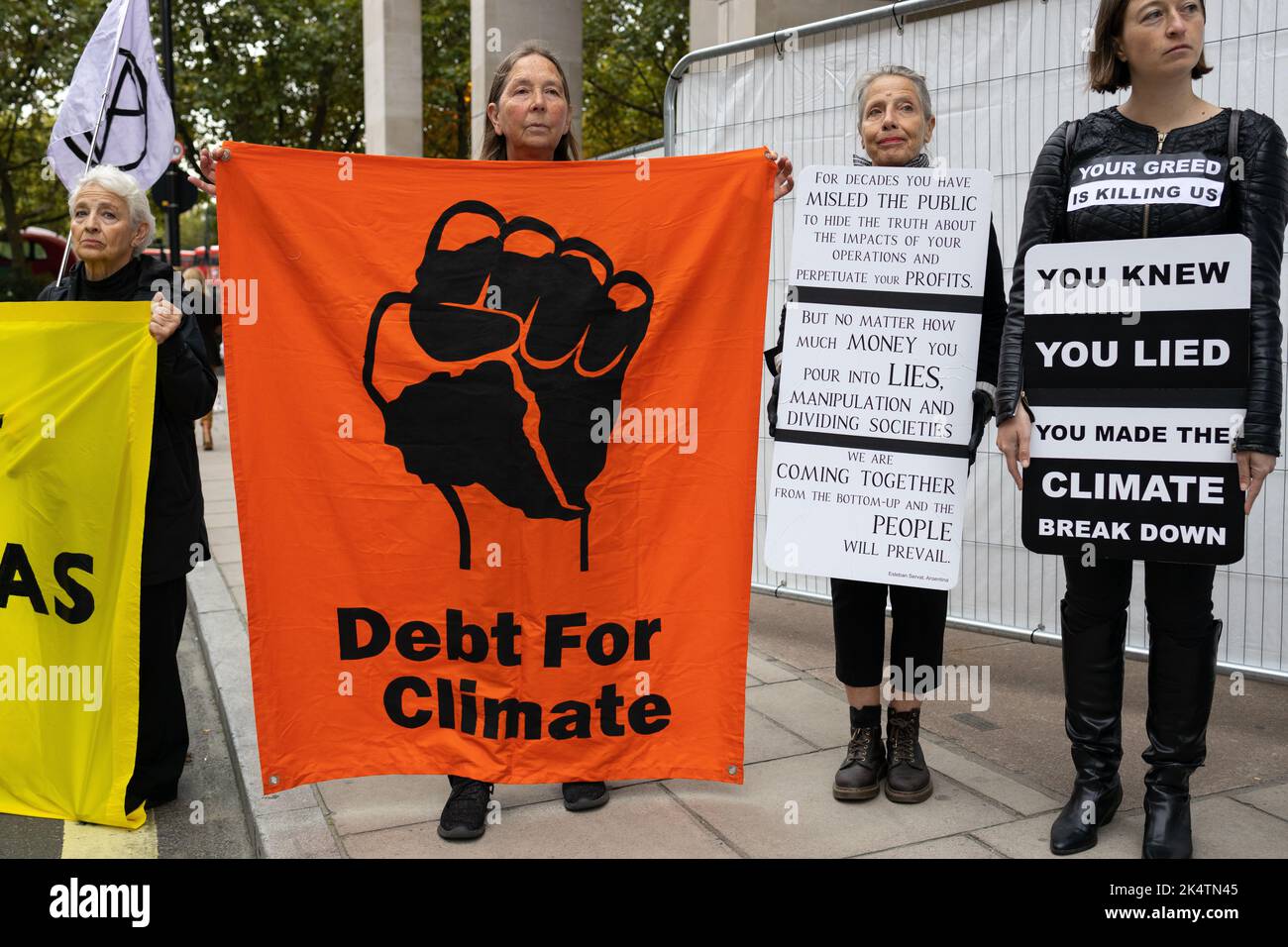 London, England, UK, 04/10/2022, A coalition of climate groups derail the start of the Energy Intelligence Forum (formerly the Oil and Money Forum) with road and door blocks at the Intercontinental Hotel, Park Lane. The coalition was made up of XR Youth, Extinction Rebellion, Money Rebellion, Christian Climate Action, Fossil Free London and Debt for Climate Credit: Denise Laura Baker/Alamy Live News Stock Photo