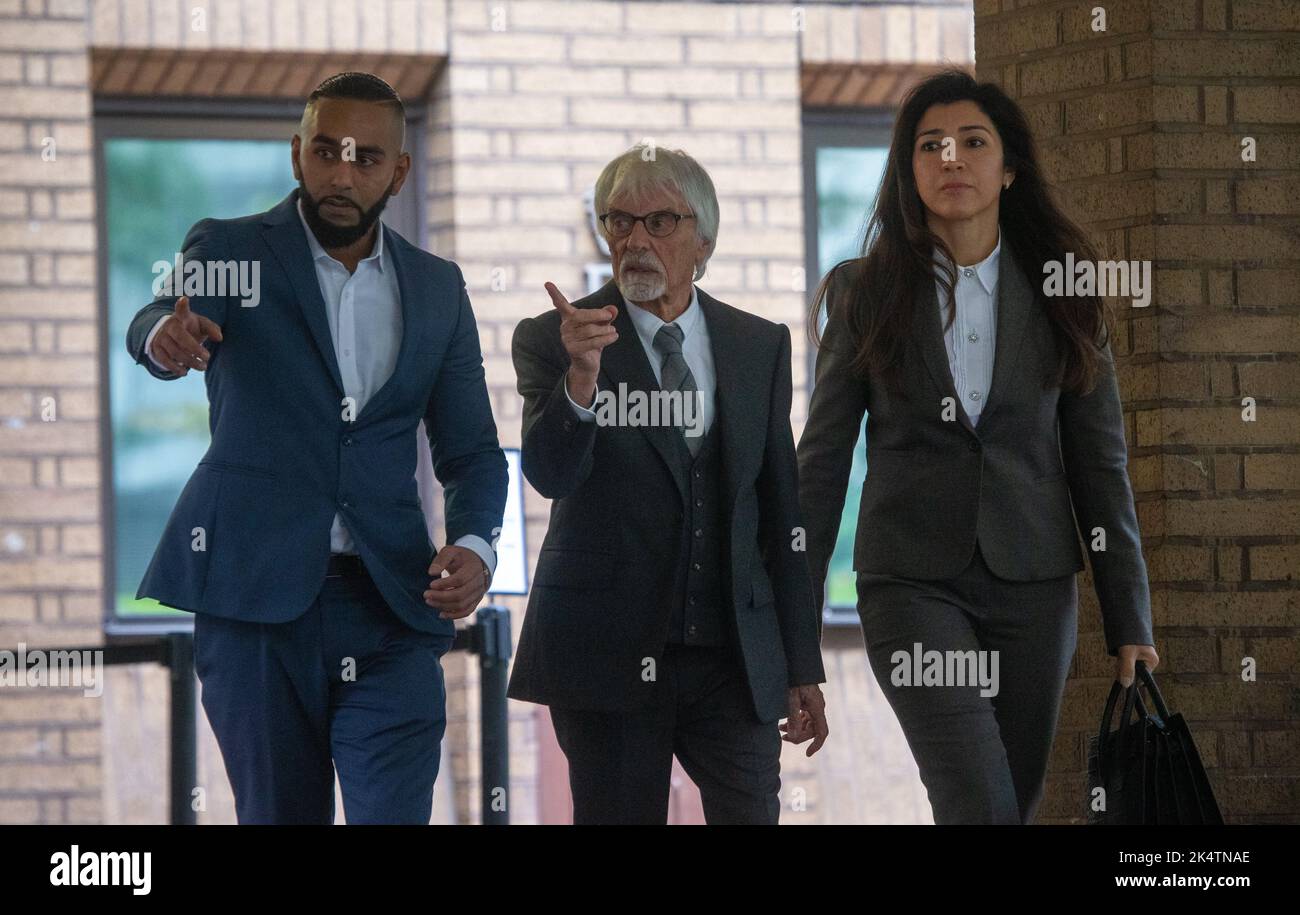 London, England, UK. 4th Oct, 2022. Former Formula-1 boss BERNIE ECCLESTONE is seen leaving Southwark Crown Court with his wife FABIANA FLOSI after the trial over fraud charges. (Credit Image: © Tayfun Salci/ZUMA Press Wire) Credit: ZUMA Press, Inc./Alamy Live News Stock Photo