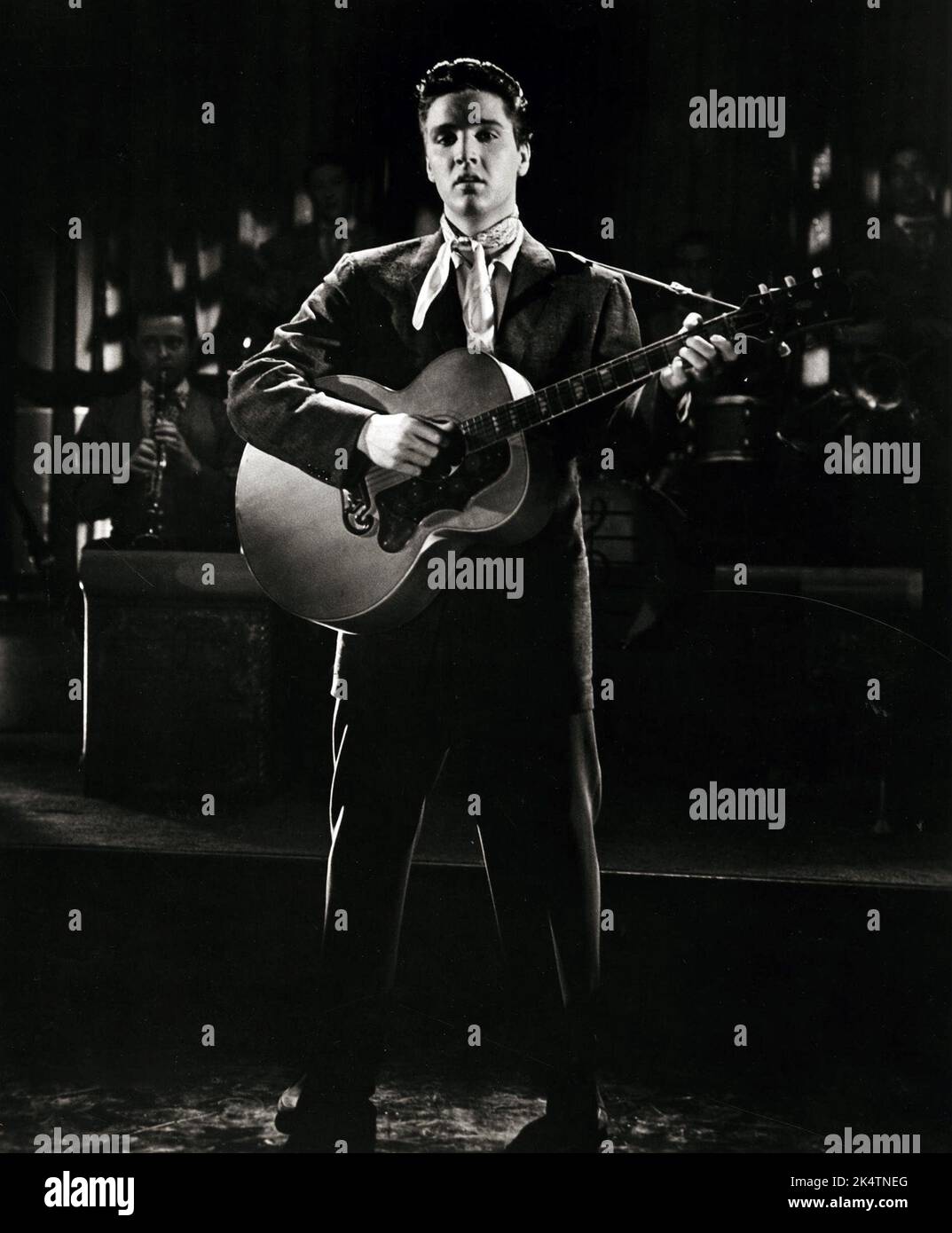 Elvis Presley with guitar. 'King Creole' (Paramount, 1958). Publicity photo. Stock Photo