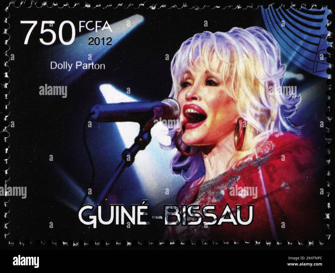 Dolly Parton on postage stamp of Mozambique Stock Photo