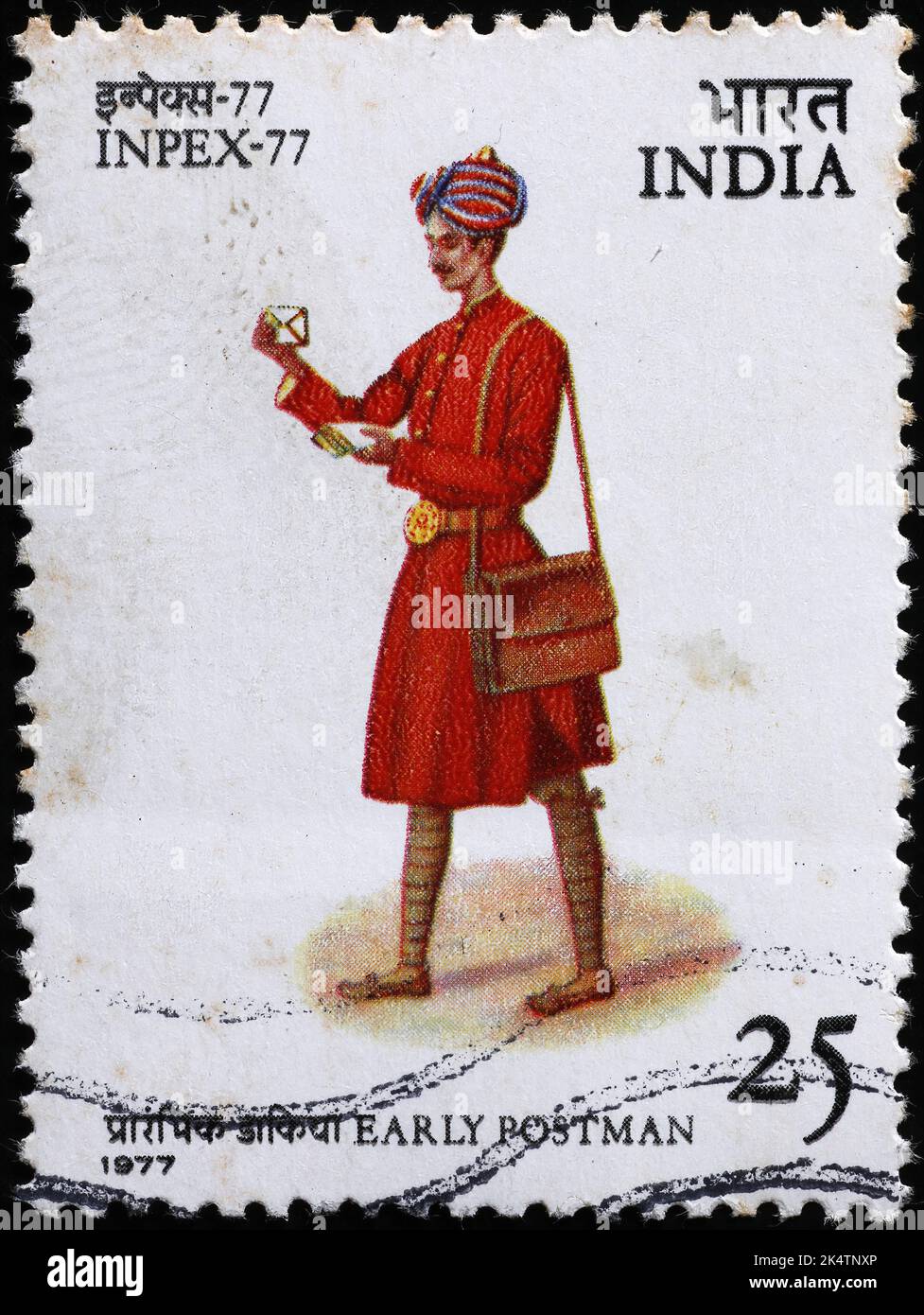 Early indian postman on vintage postage stamp Stock Photo Alamy