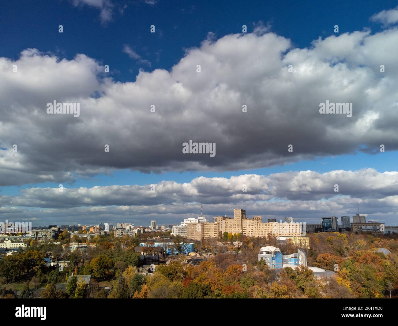 Aerial autumn historical university buildings in city center. Tourist attractions near Shevchenko City Garden park with scenic sky in Kharkiv, Ukraine Stock Photo