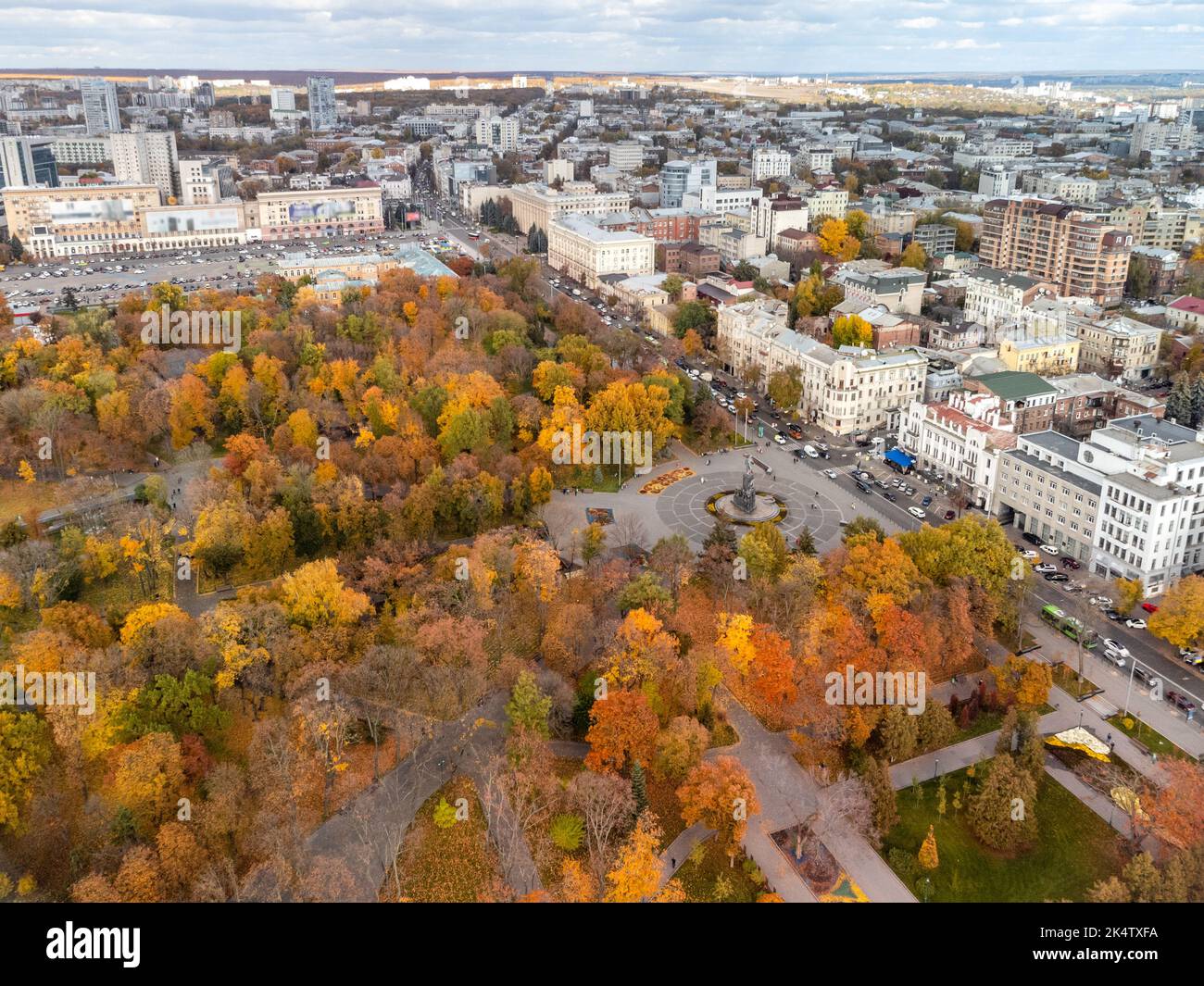 Aerial view on Taras Shevchenko Monument in autumnal colorful Kharkiv city center park. Tourist attraction and historical sights Stock Photo