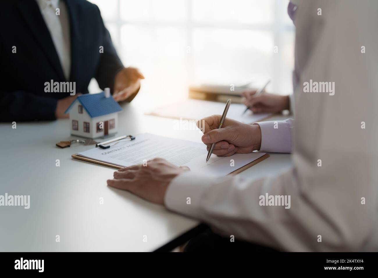 Business woman or Real Estate agent explain signing agreement for