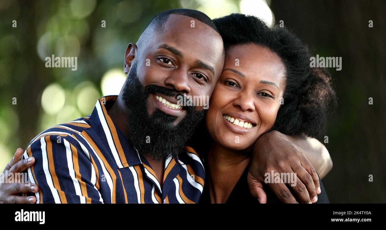 Two beautiful black African couple hugging together Stock Photo Alamy