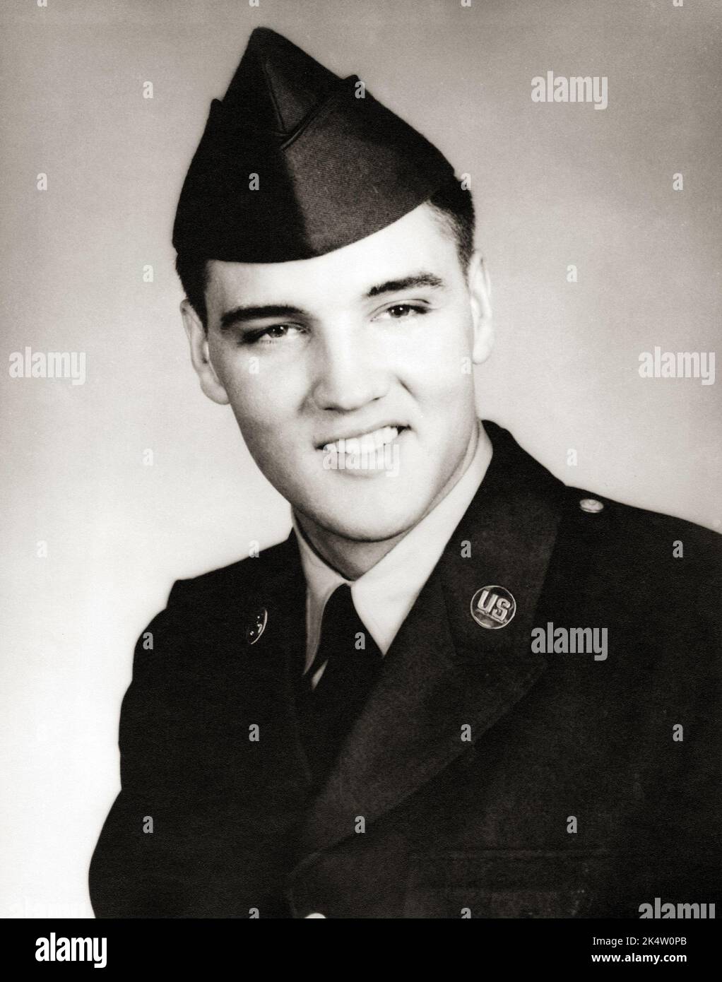 Photo of Elvis Presley in uniform with garrison cap - From March 1958 to March 1960 Presley served as a member of the United States Army and held the rank of staff sergeant Stock Photo