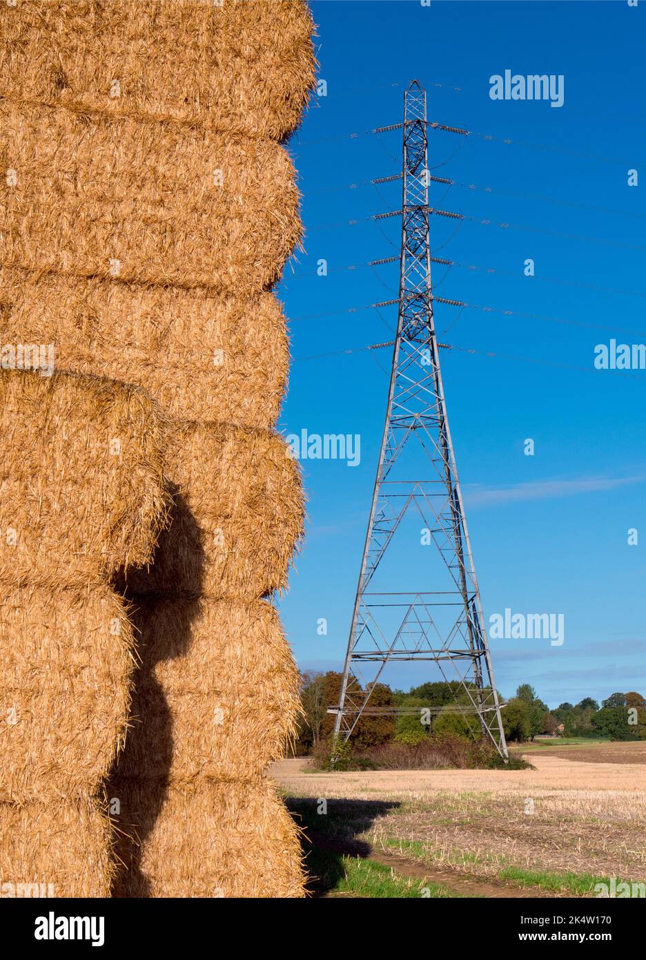 It's just after harvest time. Seen in a corn field just outside my home village of Radley, Oxfordshire, this giant haystack seems to have transcended Stock Photo
